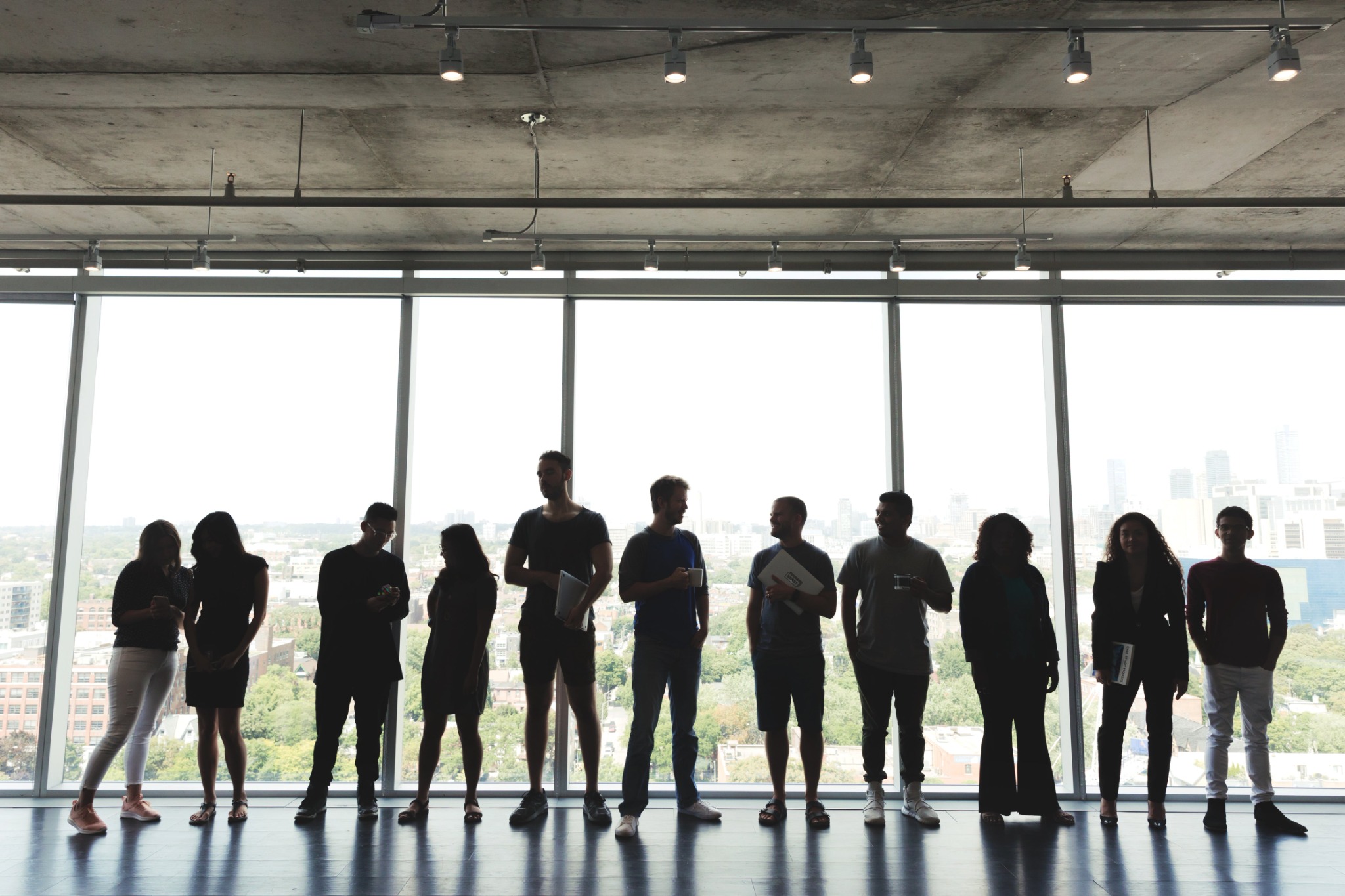 Professionals and potential team members in a modern workplace